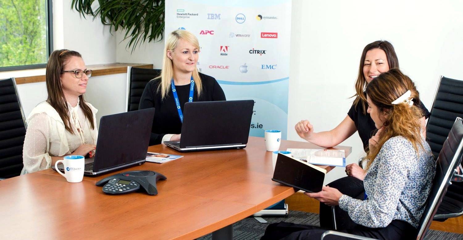 ITQuotes team collaborating with customers